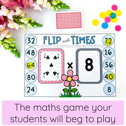 Maths game 'Flip and Times' with cards and flowers on a white background
